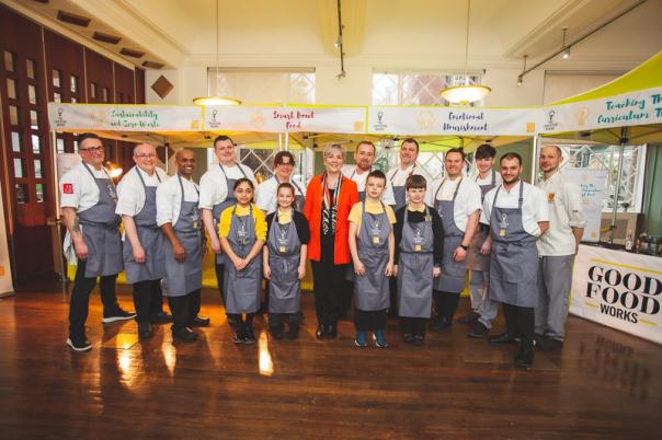 Deborah Homshaw with the CH&CO chefs and pupils from Charlton Manor Primary School